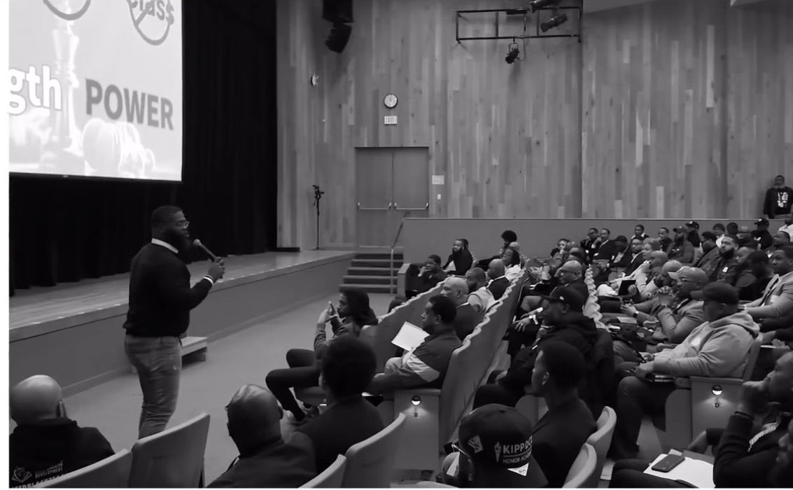 Dr. William Hayes teaching a framework to a full room
